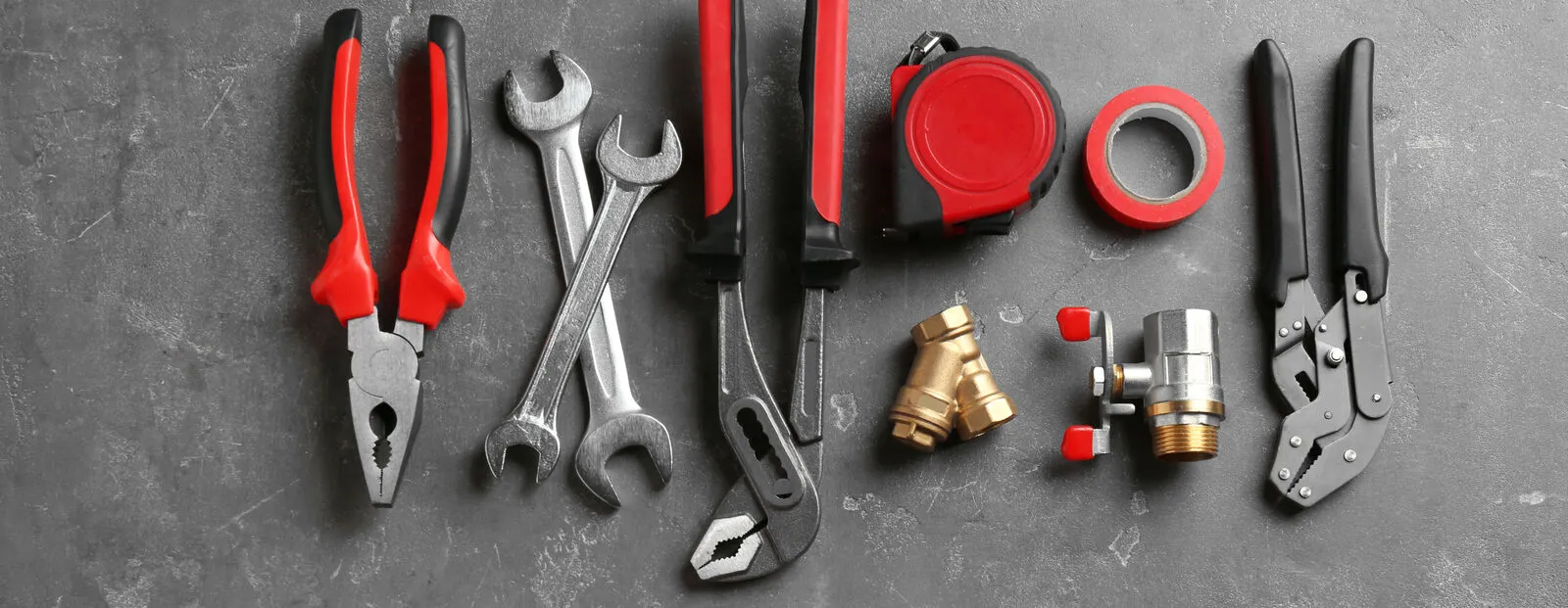 Flat lay composition with plumber's tools and space for text on gray background (1).jpg